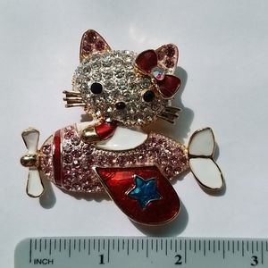 Gold Hello-Kitty in Plane Style Pin